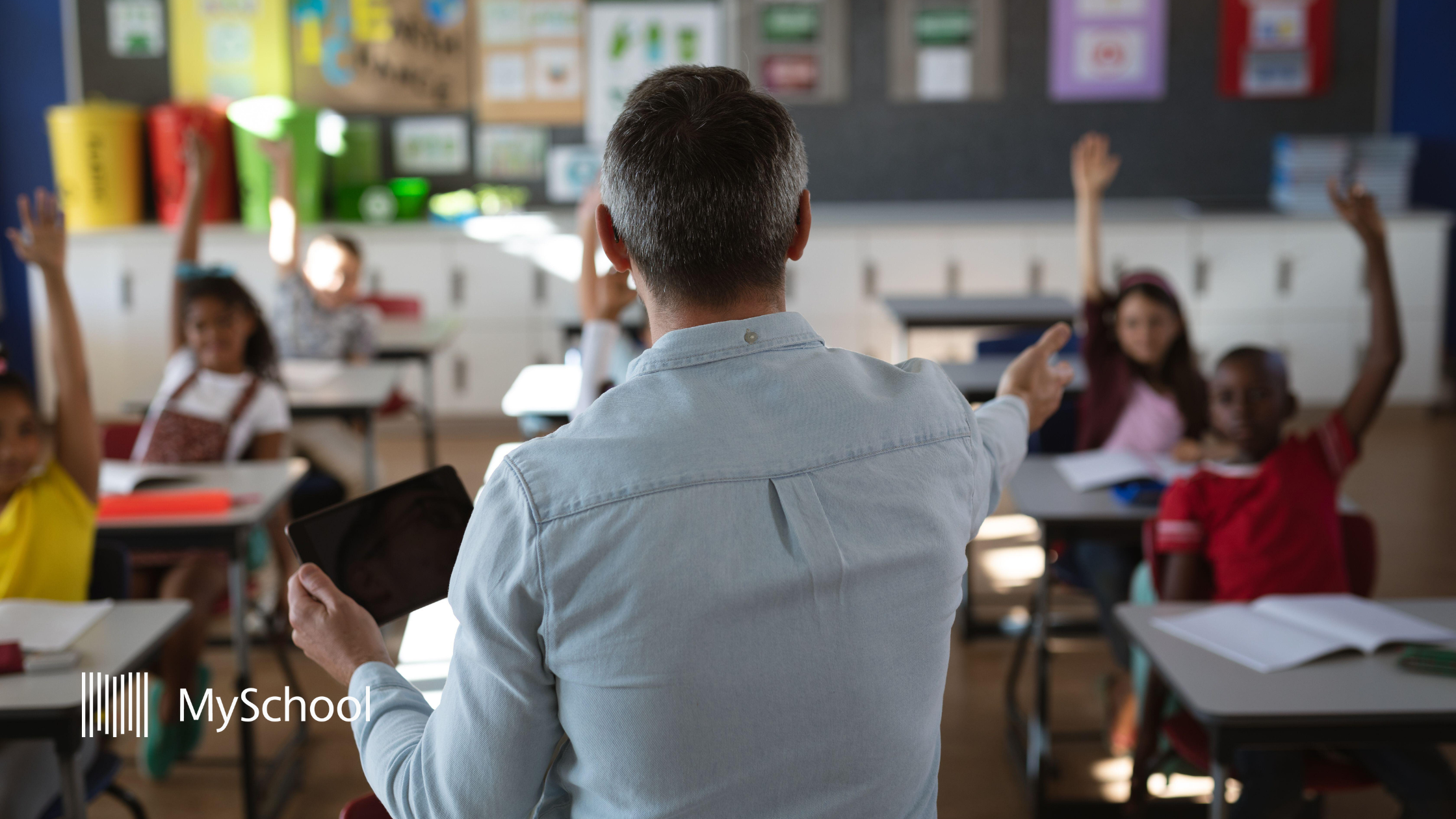 Teacher conducting classes in a k12 independent school