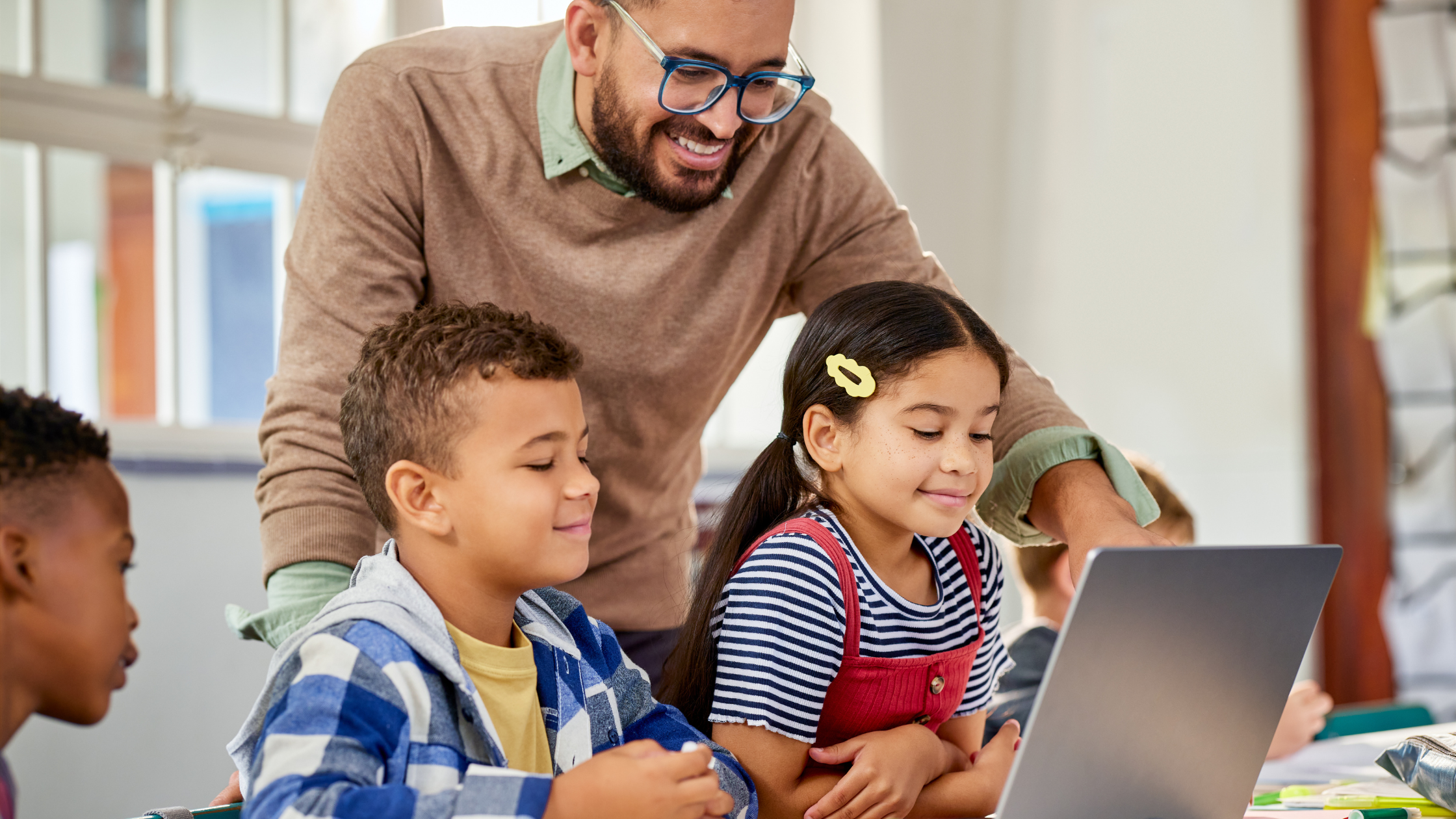 Teacher showing progress to his students using MySchool learning analytics