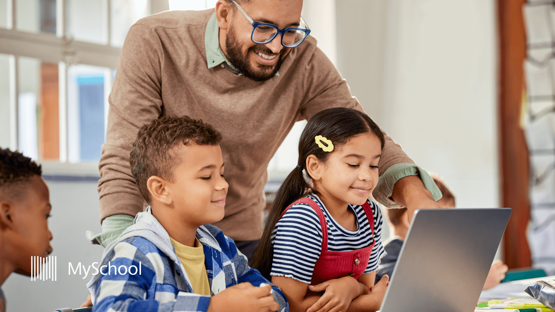 Teacher showing progress to his students using MySchool learning analytics