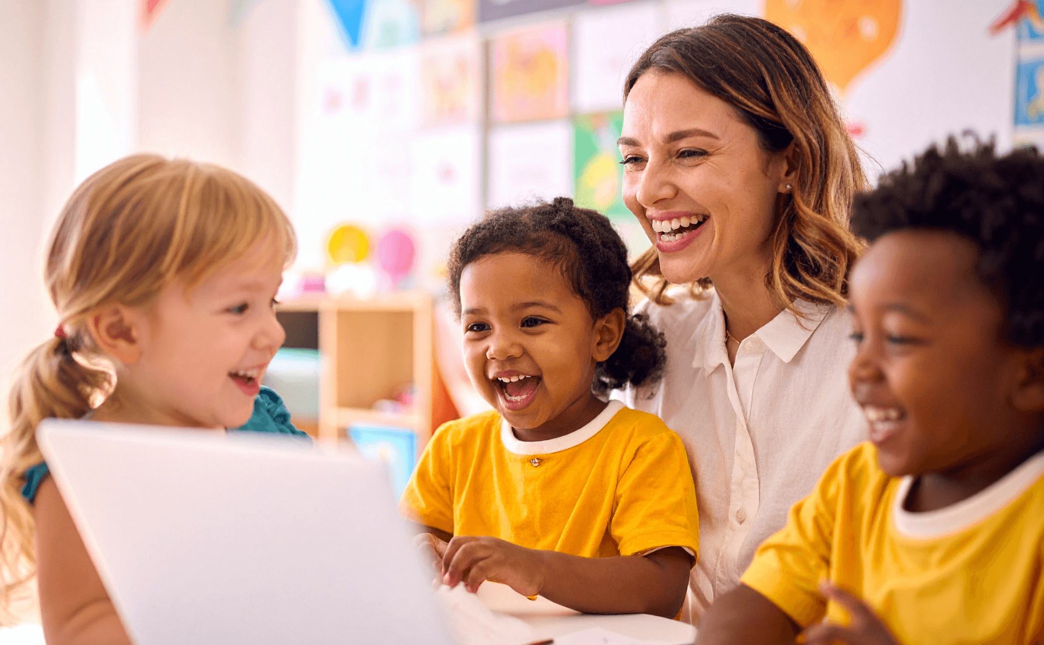 Teacher supporting students during a classroom learning activity